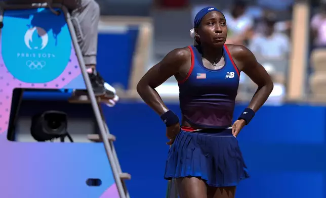 Coco Gauff of United States cries after arguing with the umpires during her women's singles third round match against Donna Vekic of Croatia, at the 2024 Summer Olympics, Tuesday, July 30, 2024, at the Roland Garros stadium in Paris, France. (AP Photo/Andy Wong)