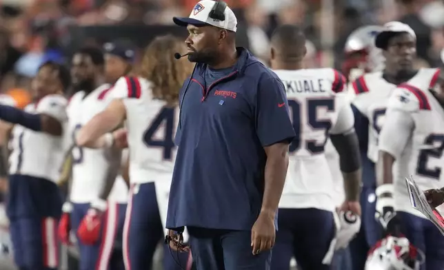 New England Patriots head coach Jerod Mayo watches from the sideline during the first half of a preseason NFL football game against the Washington Commanders, Sunday, Aug. 25, 2024, in Landover, Md. (AP Photo/George Walker IV)