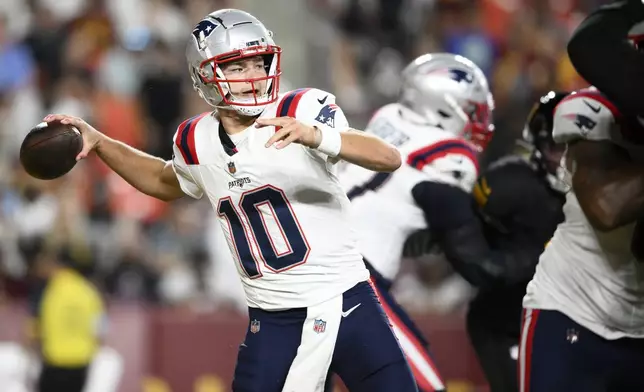 New England Patriots quarterback Drake Maye (10) passes against the Washington Commanders during the first half of a preseason NFL football game, Sunday, Aug. 25, 2024, in Landover, Md. (AP Photo/Nick Wass)