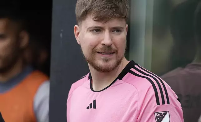 FILE - Jimmy Donaldson, the popular YouTube video maker who goes by MrBeast, wears a Lionel Messi jersey as he stands in a sideline box at the start of an MLS soccer match between Inter Miami and CF Montreal, March 10, 2024, in Fort Lauderdale, Fla. MrBeast is facing complaints about the safety of contestants from the preliminary rounds of his ambitious “Beast Games" game show, which boasts 1,000 competitors hoping for a $5 million grand prize. (AP Photo/Rebecca Blackwell, File)