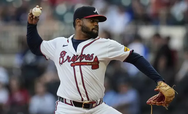 Atlanta Braves pitcher Reynaldo López (40) works in the first inning of a baseball game against the Philadelphia Phillies, Tuesday, Aug. 20, 2024, in Atlanta. (AP Photo/Mike Stewart)