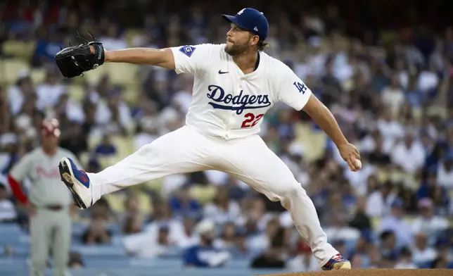 Los Angeles Dodgers starting pitcher Clayton Kershaw delivers a pitch during the first inning of a baseball game against the Philadelphia Phillies in Los Angeles, Tuesday, Aug. 6, 2024. (AP Photo/Kyusung Gong)