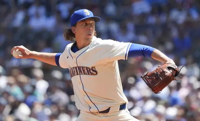 Seattle Mariners pitcher Logan Gilbert winds up to throw during the first inning of a baseball game against the Philadelphia Phillies, Sunday, Aug. 4, 2024, in Seattle. (AP Photo/Liv Lyons)