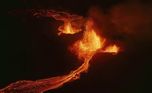 An aerial view of erupting craters and lava flows on the Reykjanes Peninsula, in Iceland, Aug. 29, 2024. (AP Photo/Marco di Marco)