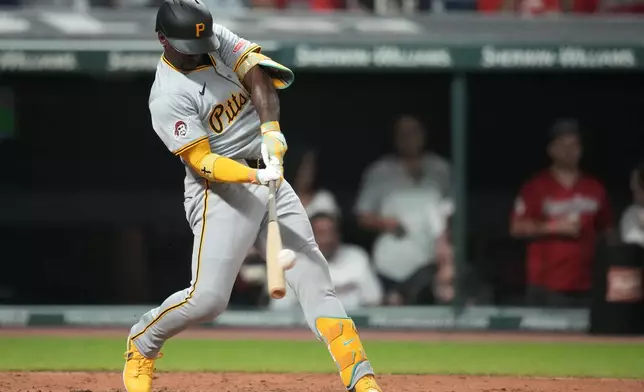 Pittsburgh Pirates' Andrew McCutchen doubles in the fifth inning of a baseball game against the Cleveland Guardians Friday, Aug. 30, 2024, in Cleveland. (AP Photo/Sue Ogrocki)