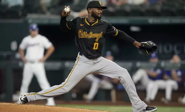 Pittsburgh Pirates' Domingo German (0) throws to the Texas Rangers in the fourth inning of a baseball game, Wednesday, Aug. 21, 2024, in Arlington, Texas. (AP Photo/Tony Gutierrez)