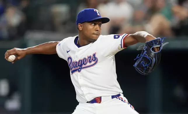 Texas Rangers relief pitcher Jose Leclerc throws to the Pittsburgh Pirates in the sixth inning of a baseball game, Wednesday, Aug. 21, 2024, in Arlington, Texas. (AP Photo/Tony Gutierrez)