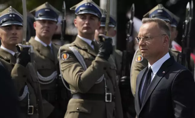 Poland's President Andrzej Duda takes part in the annual observances on Poland's armed forces day, in Warsaw, Poland, on Thursday, Aug. 15, 2024.(AP Photo/Czarek Sokolowski)