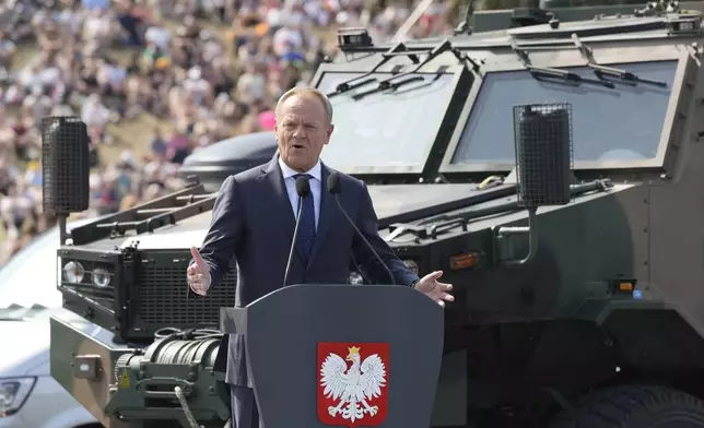 Poland's Prime Minister Donald Tusk speaks during the annual observances on Poland's armed forces day, in Warsaw, Poland, on Thursday, Aug. 15, 2024.(AP Photo/Czarek Sokolowski)