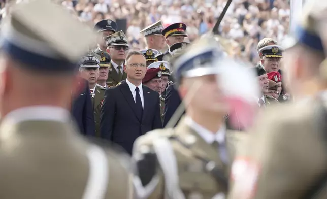 Poland's President Andrzej Duda speaks during theannual observances on Poland's armed forces day, in Warsaw, Poland, on Thursday, Aug. 15, 2024.(AP Photo/Czarek Sokolowski)