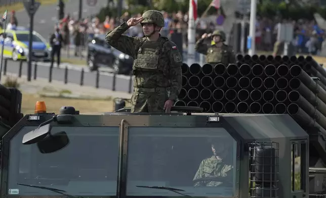 Poland's military parades during the annual observances on Poland's armed forces holiday in Warsaw, Poland, on Thursday, Aug. 15, 2024. (AP Photo/Czarek Sokolowski)