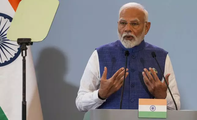 Indian Prime Minister Narendra Modi, along with his his Polish counterpart, Donald Tusk, not in picture, delivers statements to the media following talks in Warsaw, Poland, Thursday, Aug. 22, 2024. AP Photo/Czarek Sokolowski)