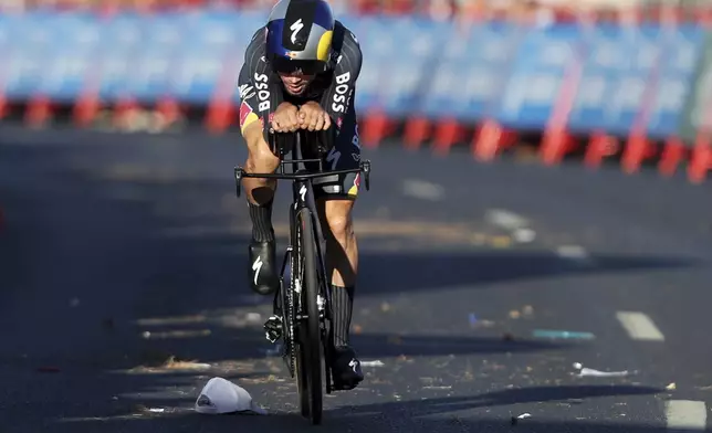 Primoz Roglic, of Slovenia, competes in the first stage of the tour of Spain, La Vuelta, cycling race, an individual time trial with start in Lisbon and finish in Oeiras, Portugal, Saturday, Aug. 17, 2024. (AP Photo/Pedro Rocha)