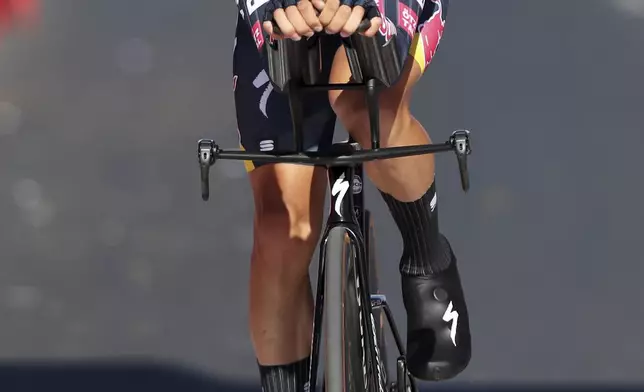 Florian Lipowitz, of Germany, crosses the finish line in the first stage of the tour of Spain, La Vuelta, cycling race, an individual time trial with start in Lisbon and finish in Oeiras, Portugal, Saturday, Aug. 17, 2024. (AP Photo/Pedro Rocha)