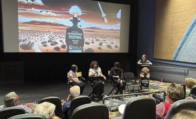 Panelists answer questions during a discussion following the first screening of "First We Bombed New Mexico" during the Oppenheimer Film Festival in Los Alamos, New Mexico, on Saturday, Aug. 17, 2024. (AP Photo/Susan Montoya Bryan)