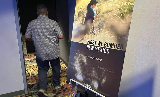 New Mexico Sen. Leo Jaramillo walks into a theater for the first screening of "First We Bombed New Mexico" during the Oppenheimer Film Festival in Los Alamos, New Mexico on Saturday, Aug. 17, 2024. The documentary tells the stories of those who lived near the Trinity Test Site when the U.S. government detonated the first atomic bomb and the Native Americans who worked in the uranium industry. (AP Photo/Susan Montoya Bryan)