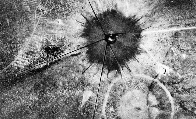 FILE - This photo shows an aerial view after the first atomic explosion at Trinity Test Site, in N.M., on July 16, 1945. (AP Photo, File)