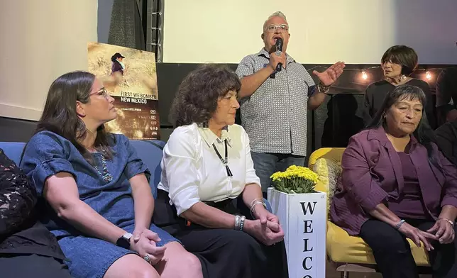 New Mexico Sen. Leo Jaramillo, center, is flanked by panelists and downwinders as they discuss the film "First We Bombed New Mexico" during the Oppenheimer Film Festival in Los Alamos, New Mexico on Saturday, Aug. 17, 2024. Advocates have been pushing for the reauthorization and expansion of the Radiation Exposure Compensation Act, saying the government has failed for decades to acknowledge New Mexico downwinders and people in other states exposed to radiation as a result of the government's nuclear weapons work.(AP Photo/Susan Montoya Bryan)