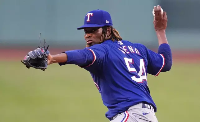 Texas Rangers pitcher Jose Urena delivers during the first inning of a baseball game against the Boston Red Sox at Fenway Park, Tuesday, Aug. 13, 2024, in Boston. (AP Photo/Charles Krupa)