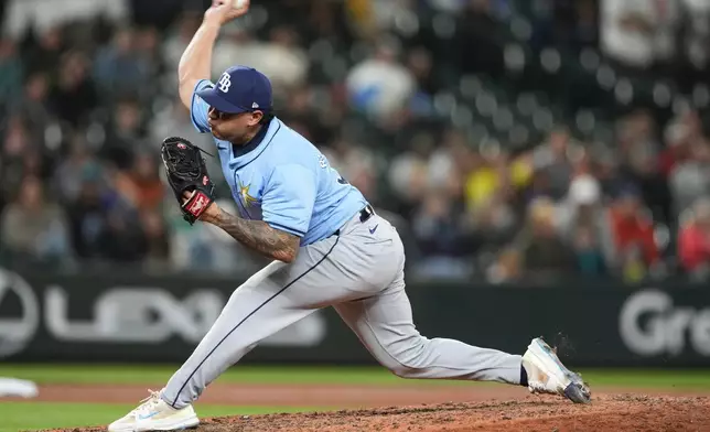 Tampa Bay Rays relief pitcher Manuel Rodriguez throws against the Seattle Mariners during the ninth inning of a baseball game, Tuesday, Aug. 27, 2024, in Seattle. (AP Photo/Lindsey Wasson)