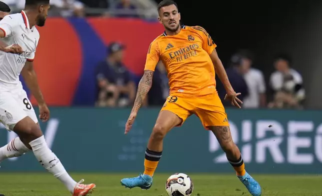 Real Madrid midfielder Dani Ceballos handles the ball during the first half of a friendly soccer match against AC Milan, Wednesday, July 31, 2024, in Chicago. (AP Photo/Erin Hooley)