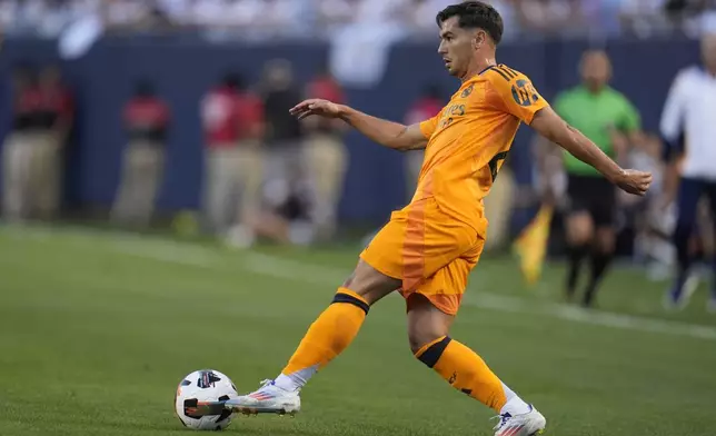 Real Madrid forward Brahim Abdelkader handles the ball during the first half of a friendly soccer match against AC Milan, Wednesday, July 31, 2024, in Chicago. (AP Photo/Erin Hooley)