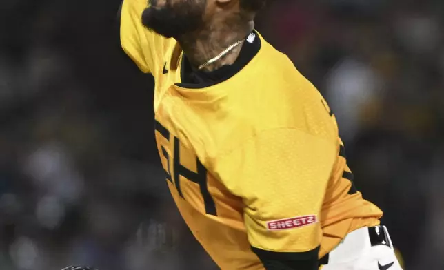 Pittsburgh Pirates pitcher Dennis Santana delivers against the Cincinnati Reds in the sixth inning of a baseball game, Friday, Aug. 23, 2024, in Pittsburgh. (AP Photo/Barry Reeger)