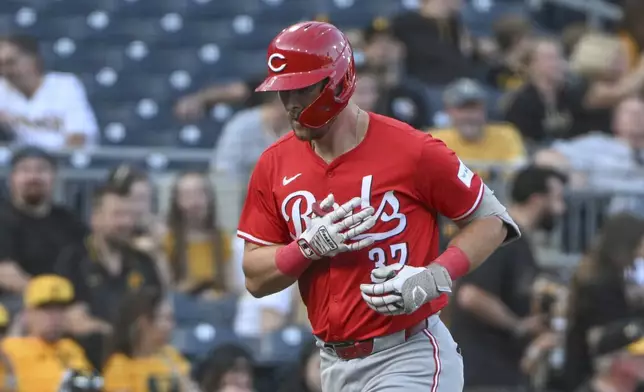 Cincinnati Reds' Tyler Stephenson celebrates after his solo home run against the Pittsburgh Pirates in the first inning of a baseball game, Friday, Aug. 23, 2024, in Pittsburgh. (AP Photo/Barry Reeger)