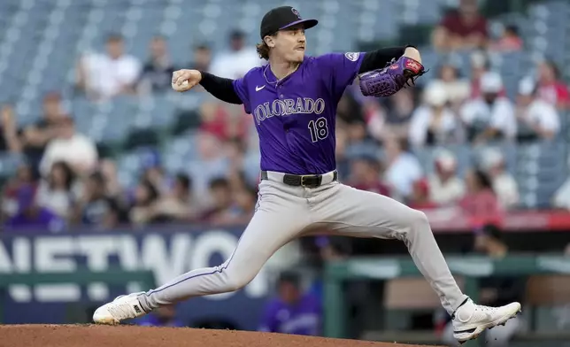 Colorado Rockies starting pitcher Ryan Feltner throws during the first inning of a baseball game against the Los Angeles Angels in Anaheim, Calif., Thursday, Aug. 1, 2024. (AP Photo/Eric Thayer)