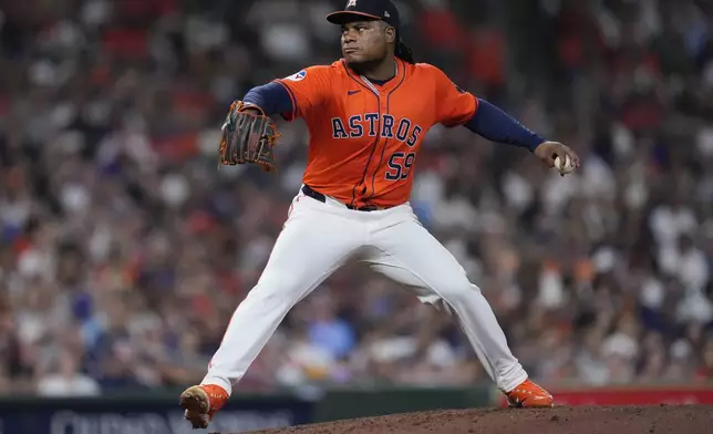 Houston Astros starting pitcher Framber Valdez delivers during the seventh inning of a baseball game against the Kansas City Royals, Friday, Aug. 30, 2024, in Houston. (AP Photo/Kevin M. Cox)