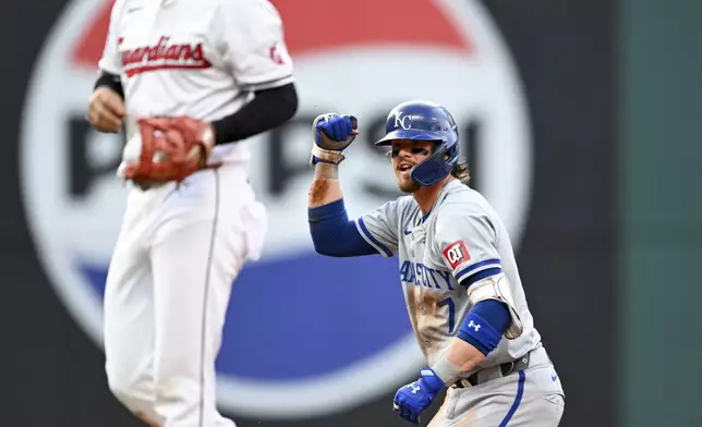 Kansas City Royals' Bobby Witt Jr. (7) celebrates hitting a double during the third inning of the second game of a baseball doubleheader against the Cleveland Guardians, Monday, Aug. 26, 2024, in Cleveland. (AP Photo/Nick Cammett)