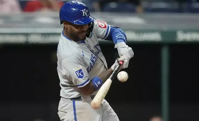 Kansas City Royals' Maikel Garcia hits a single in the seventh inning of a baseball game against the Cleveland Guardians, Tuesday, Aug. 27, 2024, in Cleveland. (AP Photo/Sue Ogrocki)