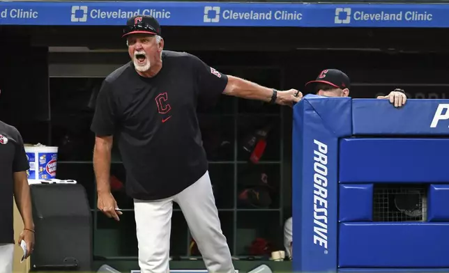 Cleveland Guardians pitching coach Carl Willis argues a strike call during the sixth inning of the second game of a baseball doubleheader against the Kansas City Royals, Monday, Aug. 26, 2024, in Cleveland. (AP Photo/Nick Cammett)