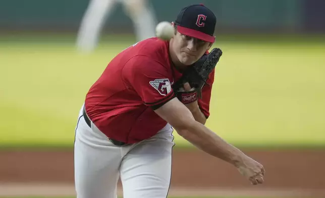 Cleveland Guardians' Gavin Williams pitches in the first inning of a baseball game against the Kansas City Royals Tuesday, Aug. 27, 2024, in Cleveland. (AP Photo/Sue Ogrocki)