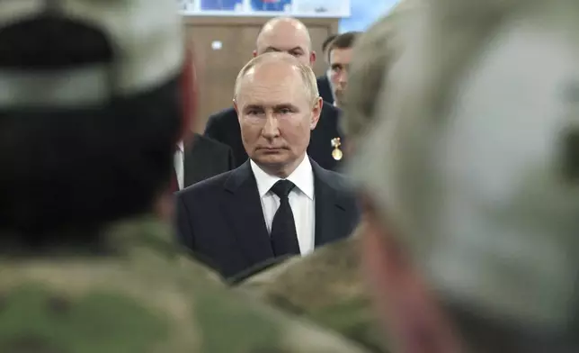 Russian President Vladimir Putin attends his visit the Special Forces University in Gudermes, Chechen Republic, Russia, Tuesday, Aug. 20, 2024. (Alexei Danichev, Sputnik, Kremlin Pool Photo via AP)