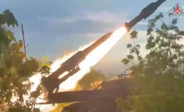 In this photo taken from video released by the Russian Defense Ministry on Sunday, Aug. 25, 2024, a Russian Army Buk-2M self-propelled, medium-range surface-to-air missile system fires at air targets in an undisclosed location in Ukraine. (Russian Defense Ministry Press Service via AP)