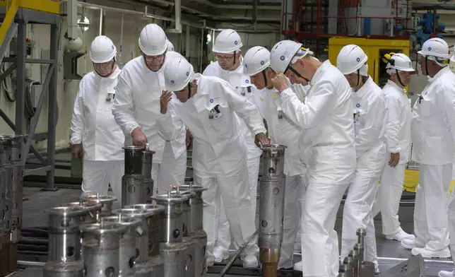 In this photo released by Rosatom State Atomic Energy Corporation, International Atomic Energy Agency chief Rafael Grossi, third left, visits the Kursk Nuclear Power Plant (KNPP) outside the town of Kurchatov, in the Kursk Region, Russia, on Tuesday, Aug. 27, 2024. (Rosatom State Atomic Energy Corporation via AP)