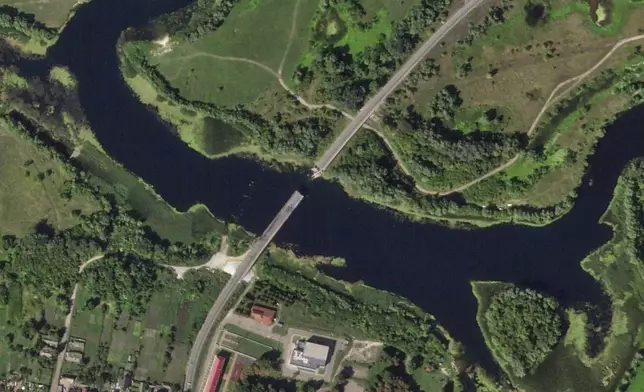 This satellite photo from Planet Labs PBC shows a destroyed bridge across the Seim River at the town of Glushkovo in Russia's Kursk region on Aug. 17, 2024. (Planet Labs PBC via AP)