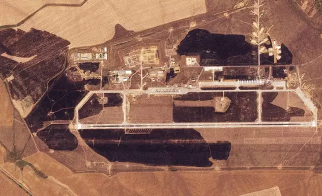 This satellite image released by Planet Labs PBC shows the aftermath of a Ukrainian drone attack on the Marinovka Air Base in Russia on Thursday, Aug. 22, 2024. (Planet Labs PBC via AP)