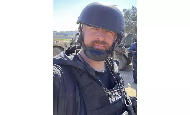 Reuters safety adviser Ryan Evans takes a selfie while working with a news reporting team near the border with Gaza in Be'eri, southern Israel, Feb. 8, 2024. (Ryan Evans/Reuters via AP)