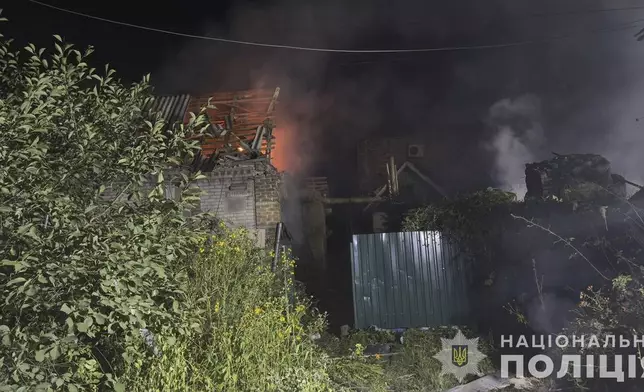 In this photo provided by the National Police of Ukraine on Tuesday, August 27, 2024, a residential house is seen on fire after Russian airstrike in Zaporizhzhia, Ukraine. (National Police of Ukraine via AP)