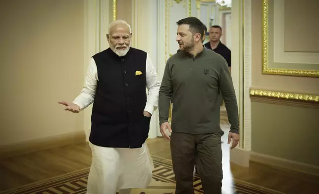 In this photo provided by the Ukrainian Presidential Press Office, shows Indian Prime Minister Narendra Modi, left, speaking with Ukrainian President Volodymyr Zelenskyy in Kyiv, Ukraine, Friday, Aug. 23, 2024. (Ukrainian Presidential Press Office via AP)