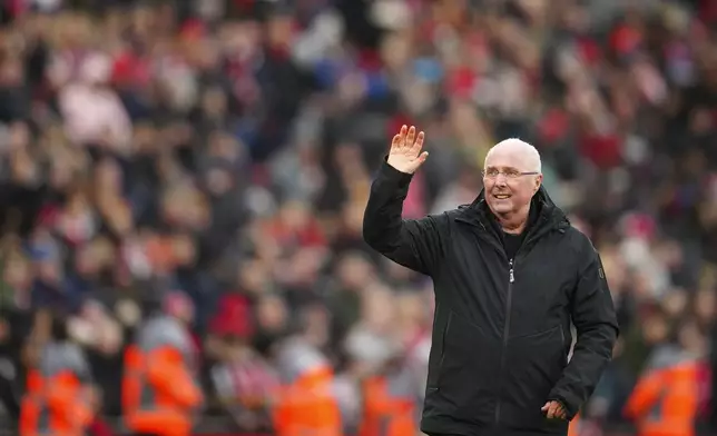 FILE - Former England manager Sven-Goran Eriksson waves to the crowd after an exhibition soccer match between Liverpool Legends and Ajax Legends at Anfield Stadium, Liverpool, England, Saturday March 23, 2024. Eriksson the Swedish soccer manager who spent five years as England’s first ever foreign-born coach, has died. He was 76, it was announced on Monday, Aug. 26, 2024. (AP Photo/Jon Super, File)