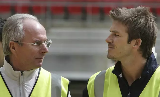 FILE - England's manager Sven Goran Eriksson, left, and captain David Beckham of Real Madrid, right, take part in a tour at Wembley stadium, in London, Tuesday May 23, 2006. Eriksson the Swedish soccer manager who spent five years as England’s first ever foreign-born coach, has died. He was 76, it was announced on Monday, Aug. 26, 2024. (AP Photo/Lefteris Pitarakis, File)