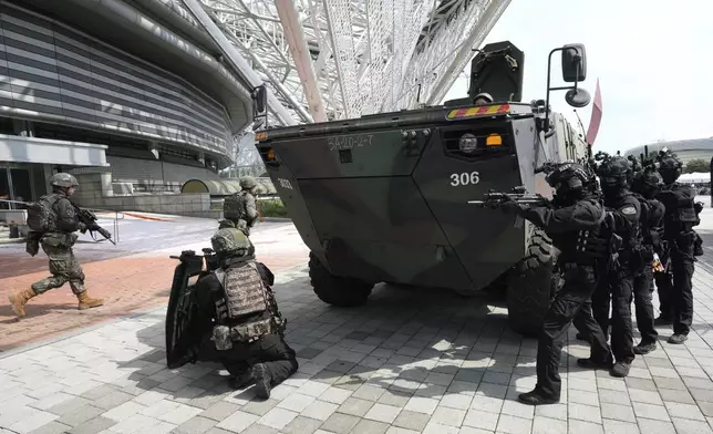 South Korea's police special operations unit conduct an anti-terror drill as a part of the Ulchi Freedom Shield military exercise between the U.S. and South Korea in Seoul, South Korea, Tuesday, Aug. 20, 2024. (AP Photo/Ahn Young-joon)