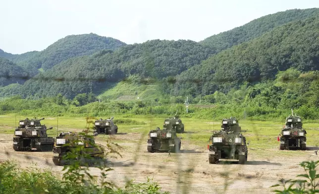 South Korean army's K-9 self-propelled howitzers take positions in Paju, South Korea, near the border with North Korea, Monday, Aug. 19, 2024. (AP Photo/Ahn Young-joon)