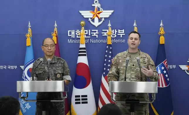 Col. Ryan Donald, right, CFC/UNC/USFK Public Affairs Director, and Col. Lee Sung-jun of South Korea's JCS Public Affairs Director, attend a press briefing of the Ulchi Freedom Shield exercises at the Defense Ministry in Seoul, South Korea, Monday, Aug. 12, 2024. (AP Photo/Ahn Young-joon)