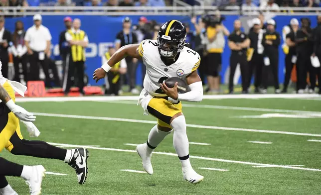 Pittsburgh Steelers quarterback Justin Fields (2) rushes during the first half of an NFL preseason football game against the Detroit Lions, Saturday, Aug. 24, 2024, in Detroit. (AP Photo/Jose Juarez)