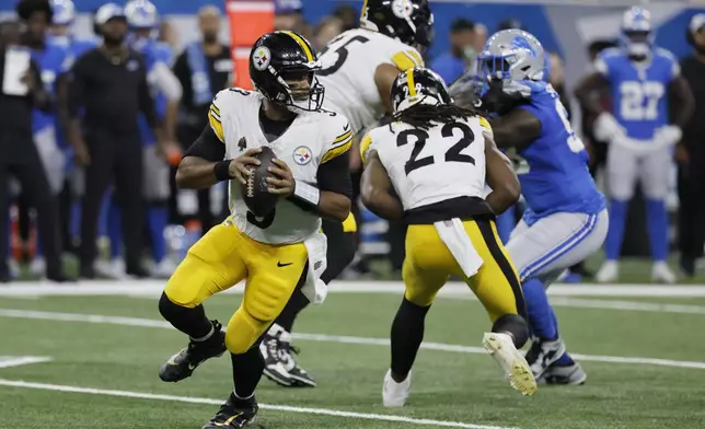 Pittsburgh Steelers quarterback Russell Wilson looks downfield during the first half of an NFL preseason football game against the Detroit Lions, Saturday, Aug. 24, 2024, in Detroit. (AP Photo/Duane Burleson)