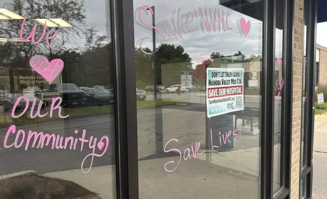 Heartfelt notes are written on windows outside of the Nashoba Valley Medical Center in Ayer, Mass., on Tuesday, Aug. 20, 2024. (AP Photo/Nick Perry)